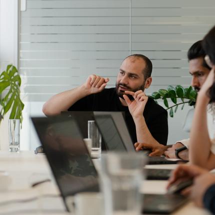 ClimatePartner Team im Meeting
